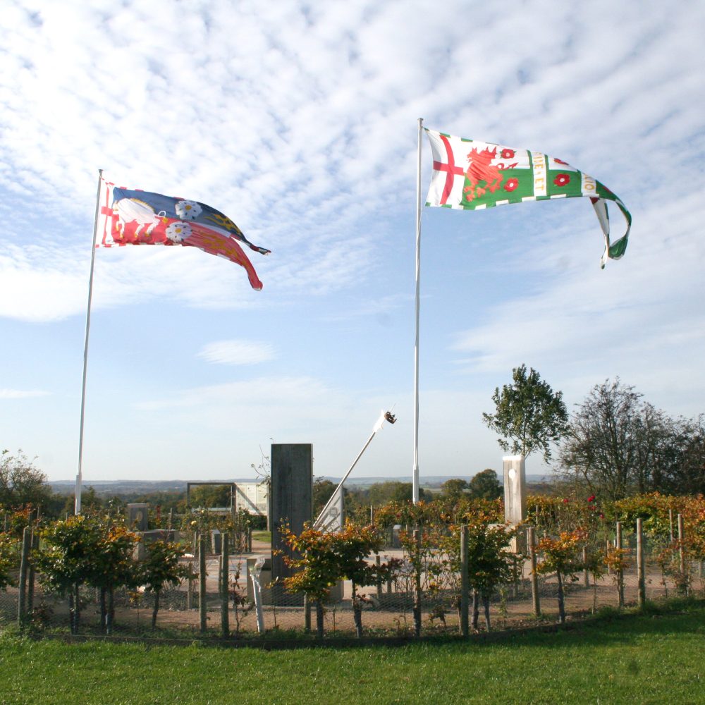 Bosworth Sundial Surrounded By Two Flags In The Air Aspect Ratio 1000 1000